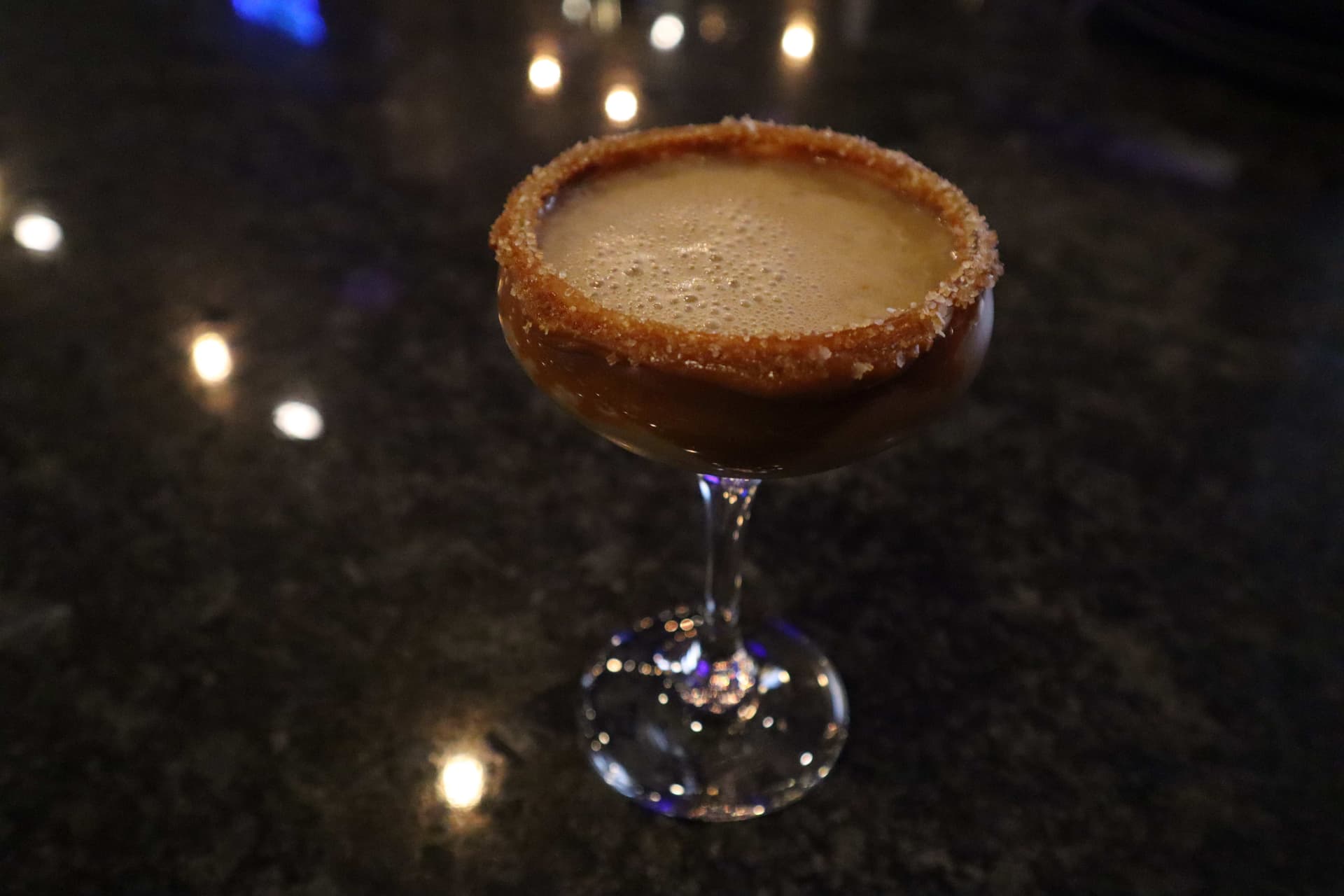 Caramel cocktail in a sugar-rimmed coupe glass