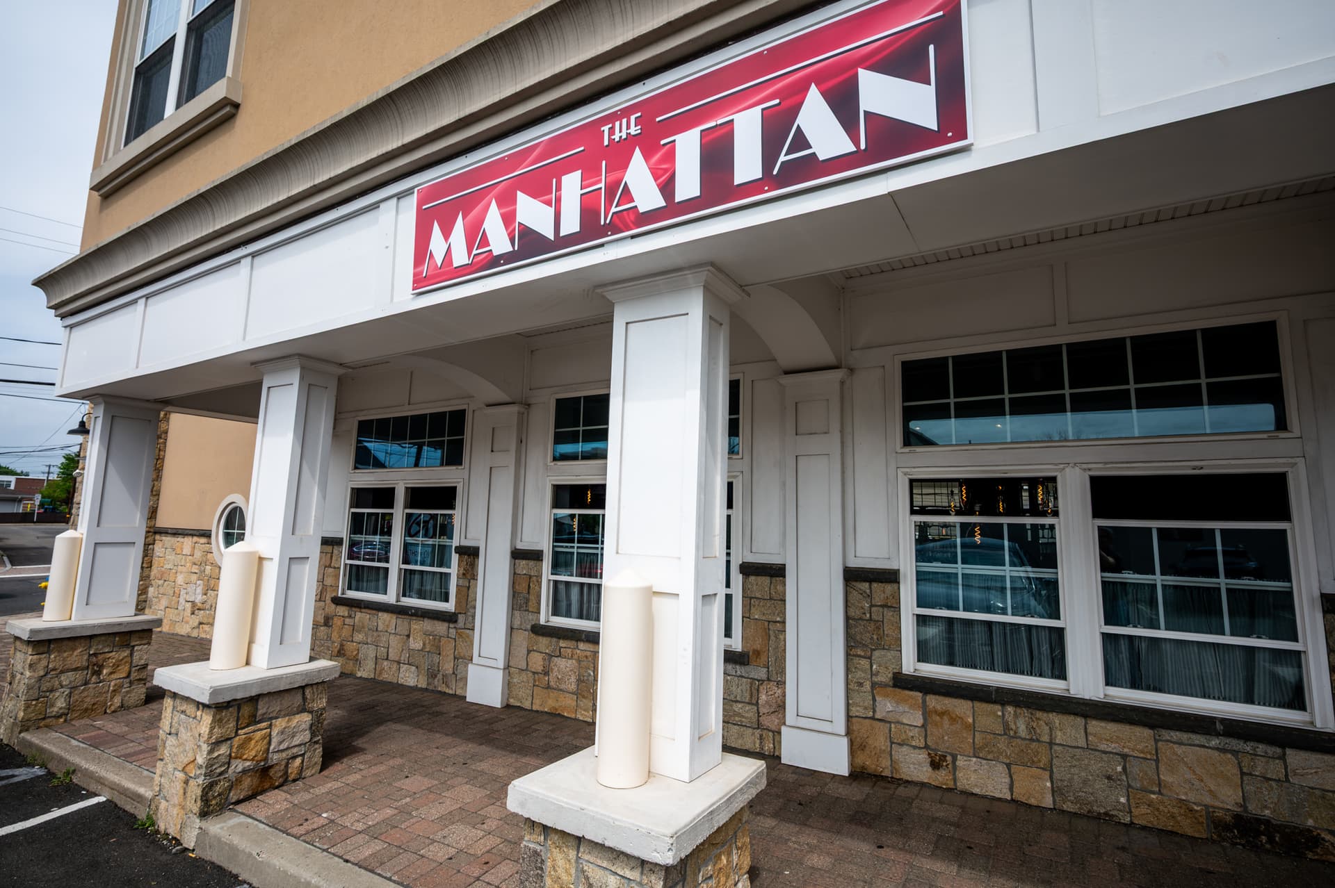 The Manhattan restaurant exterior on Center Street