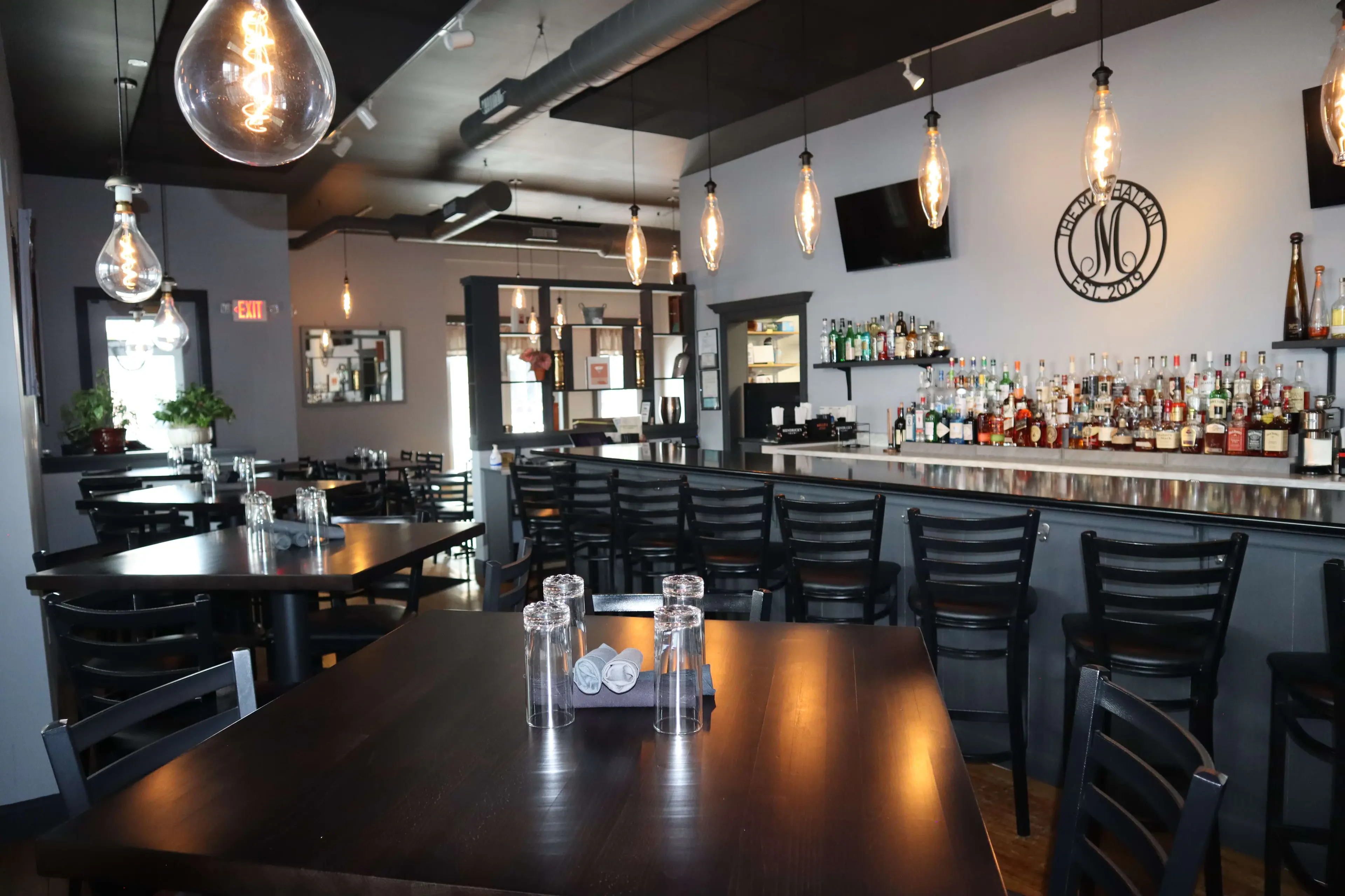 The Manhattan restaurant interior with bar and dining